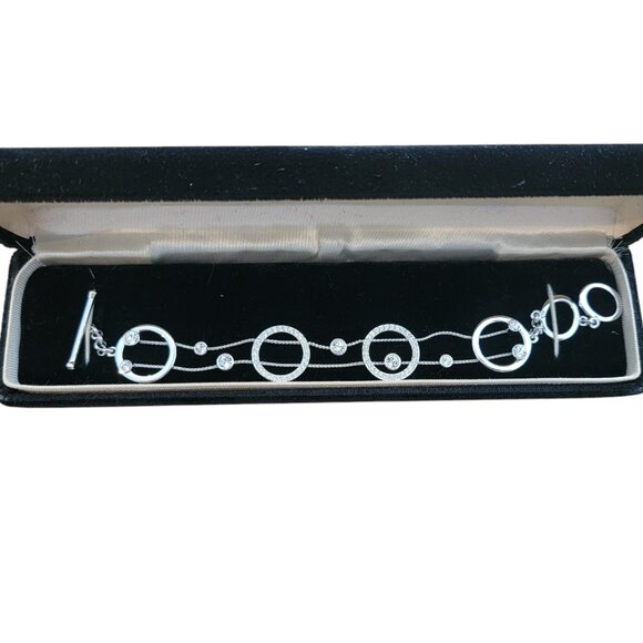 Jacobs Jewelers Silver Tone Modern Minimalist Circle and Toggle Bracelet, CZ - Picture 1 of 10